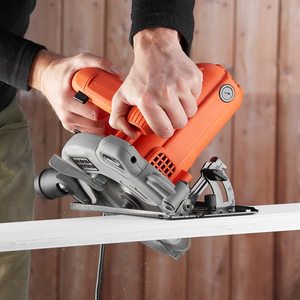 BLACK+DECKER 1250W Circular Saw in use.