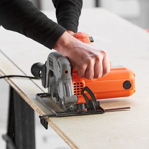 BLACK+DECKER 1250W Circular Saw in use.