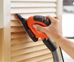BLACK+DECKER 55W Mouse Sander in use.