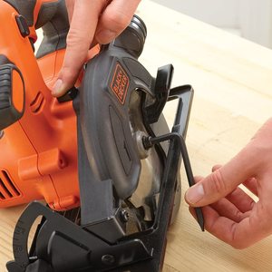 Changing the BLACK+DECKER Cordless Circular Saw's blade.