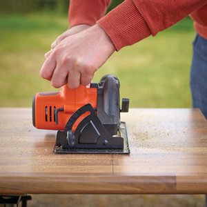 BLACK+DECKER Cordless Circular Saw in use.
