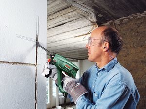 Bosch PBH 2100 RE Rotary Hammer in use.
