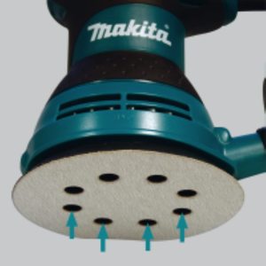 Installing sandpaper on the Makita BO5031 Random Orbit Sander.