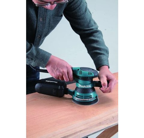 Makita BO5041 Random Orbit Sander in use.