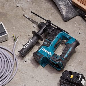 Makita DHR171Z Rotary Hammer on the ground.