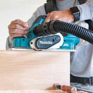 Makita DKP181Z Cordless Planer in use.