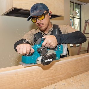 Makita DKP181Z Cordless Planer in use.