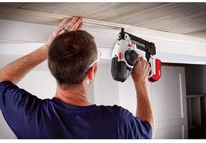 PORTER-CABLE Cordless Brad Nailer in use.