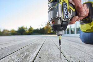 Ryobi R18IDBL-0 Impact Driver in use.
