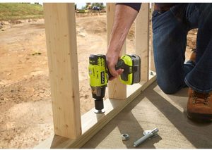 Ryobi R18IW3-0 Impact Wrench in use.