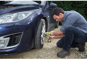Ryobi R18IW3-0 Impact Wrench in use.