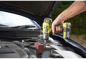 Ryobi R18IW3-0 Impact Wrench in use.