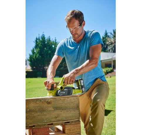 Ryobi R18PL-0 18V ONE+ Cordless Planer in use.
