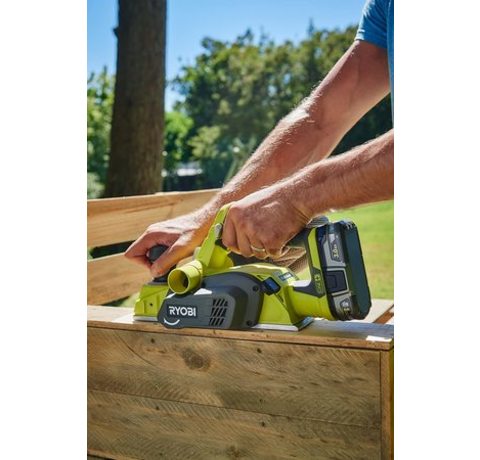 Ryobi R18PL-0 18V ONE+ Cordless Planer in use.
