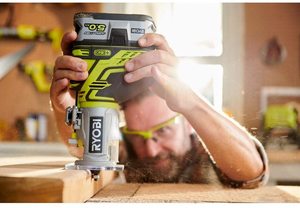 Ryobi R18TR-0 ONE+ Cordless Trim Router in use.