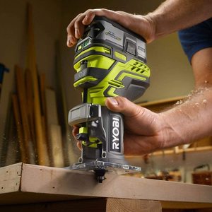 Ryobi R18TR-0 ONE+ Cordless Trim Router in use.