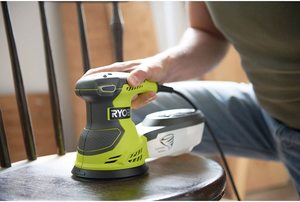 Ryobi ROS300 Random Orbit Sander in use.