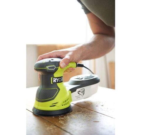 Ryobi ROS300 Random Orbit Sander in use.
