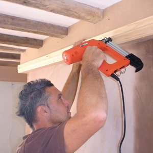 Tacwise 1183 Electric Nail Gun in use.