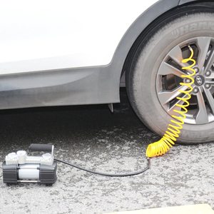 TIREWELL 12V Tyre Inflator in use.